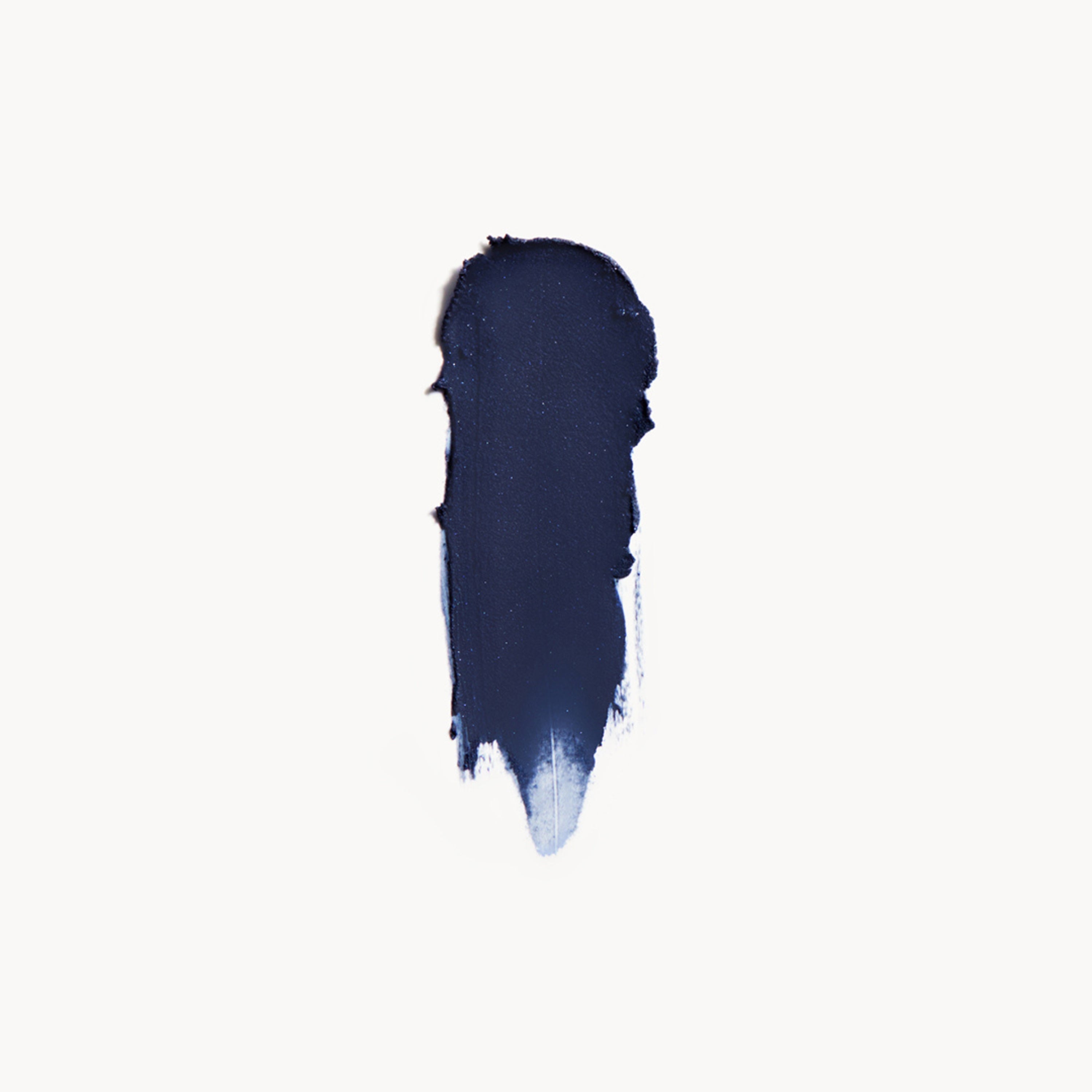 Navy blue cream eye shadow swatch on a white background